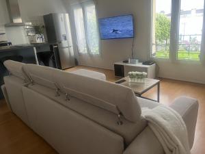 Appartements WonderSuite appartement - centre ville avec parking couvert -15mn de Paris et 10 mn de Stade de France, wifi, Netflix : photos des chambres