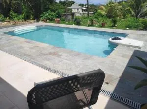 villa créole en bois vue mer - Plaisance