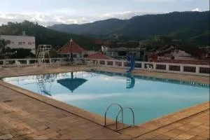 Apt charmoso com maravilhosa área de lazer - Lambari