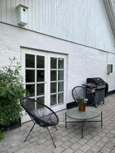 Charmerende lejlighed på landet med privat skov