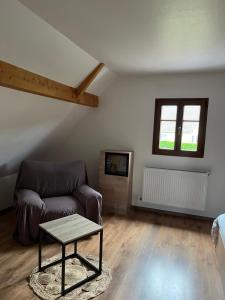 Appartements Ancienne ferme de Charles : photos des chambres