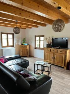 Appartements Ancienne ferme de Charles : photos des chambres