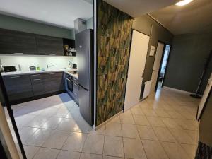 Appartements F3 rez-de-chaussee Centre ville au calme avec Balcon Garage et Netflix : photos des chambres