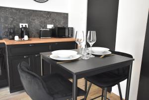 Appartements Suite Arum classee 3 etoiles avec terrasse : photos des chambres