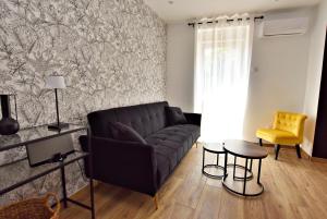 Appartements Suite Arum classee 3 etoiles avec terrasse : photos des chambres