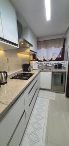 Apto com lareira, ar quente frio a 800m do centro