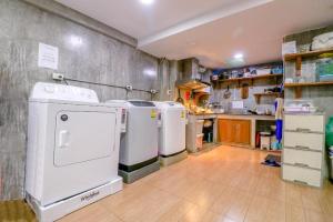 OYO 935 The Palm Apartment