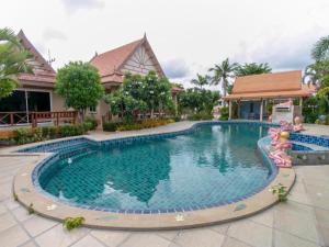 CAPITAL O961 Baan Dow Chompoo Resort