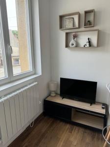 Appartements Studio cosy - Hyper centre : photos des chambres