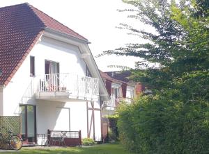 Kleine Ferienwohnung mit Terrasse und Gartenblick