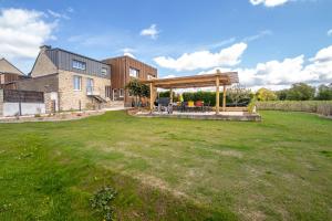 Maisons de vacances Lenesthan - Superbe gite tout confort et spa : photos des chambres