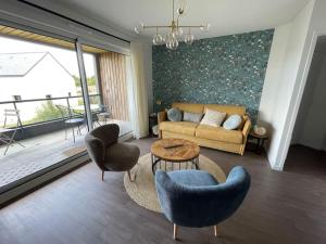 Appartements Blue Sand - Appartement cosy-neuf a 500 m du bourg : photos des chambres