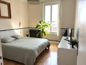 Appartements GRAND APPARTEMENT DE CARACTERE a VICHY : photos des chambres