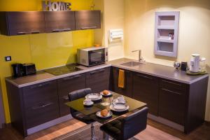 Appartements OIQIA • Launaguet : photos des chambres