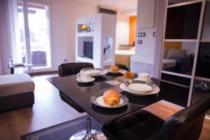 Appartements OIQIA • Launaguet : photos des chambres