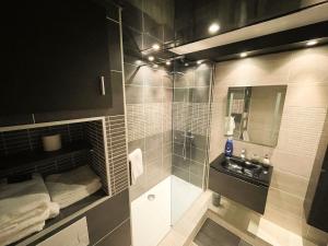 Appartements OIQIA • Launaguet : photos des chambres
