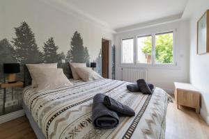 Appartements OIQIA • Clairiere : photos des chambres
