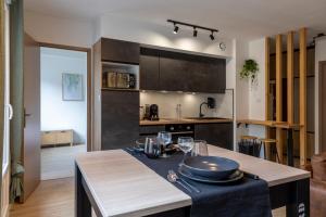 Appartements OIQIA • Clairiere : photos des chambres