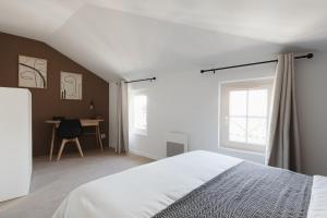 Appartements OIQIA • Arthea • Atelier : photos des chambres