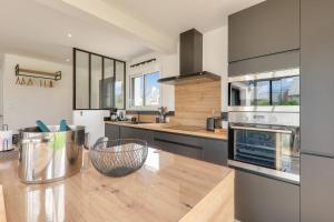 Maisons de vacances Maison avec jardin - a 400m plage des Govelins : photos des chambres