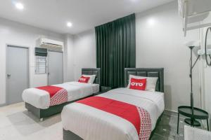OYO 818 Suksomboon Residence