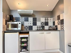 Appartements MAISON DE VILLE 10 personnes CLOS CHASSAING- WIFI -CENTRE VILLE -PROPERTY RENTAL NM : photos des chambres