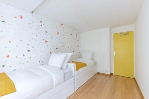 Appartements OIQIA • Pop Factory : photos des chambres