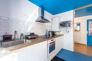 Appartements OIQIA • Pop Factory : photos des chambres
