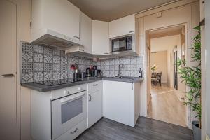 Appartements OIQIA • Hesychia : photos des chambres