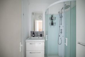 Appartements OIQIA • Hesychia : photos des chambres