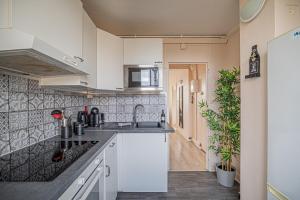 Appartements OIQIA • Hesychia : photos des chambres