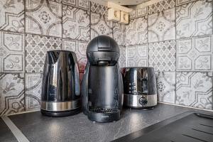Appartements OIQIA • Hesychia : photos des chambres