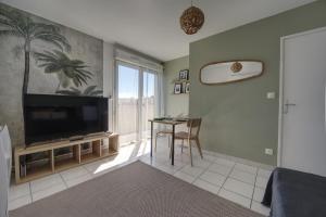 Appartements La Palm Room ~ Climatisation ~ Balcon ~ Parking : photos des chambres