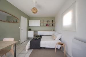 Appartements La Palm Room ~ Climatisation ~ Balcon ~ Parking : photos des chambres