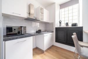 Appartements OIQIA • Castela : photos des chambres