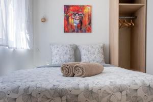 Appartements OIQIA • Castela : photos des chambres