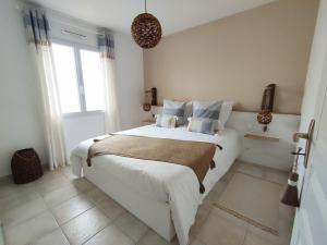 Maisons de vacances Maison de vacances, cosy, boheme chic, avec jardin! : photos des chambres