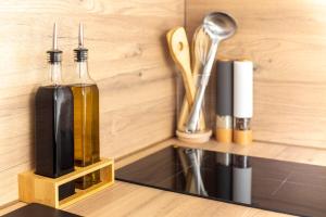 Appartements OIQIA • Hesperis : photos des chambres