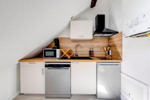 Appartements OIQIA • Hesperis : photos des chambres