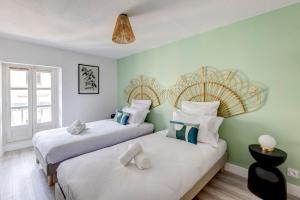 Appartements OIQIA • Hesperis : photos des chambres