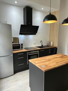 Appartements Au coeur des Caladons : photos des chambres