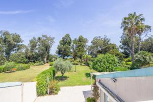 Palmeria - Maison climatisée accès direct plage