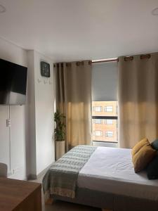 Apartamento con piscina climatizada, excelente ubicación, luz natural, acogedor y con estilo