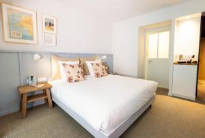 Hotels Eco-Domaine La Fontaine - HOTEL-SPA - Plage de la Fontaine aux Bretons : photos des chambres