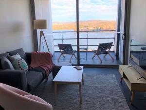 Lake view city apartment with free parking - Hosted by CanStay