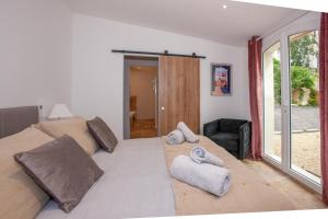 Appartements Les Tropeziennes de Libourne : photos des chambres