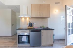 Appartements Viognier - logement avec jacuzzi : photos des chambres