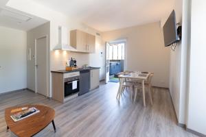 Appartements Viognier - logement avec jacuzzi : photos des chambres