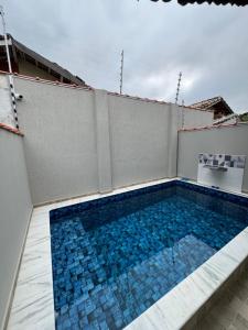 Casa nova na praia com piscina - Mongaguá