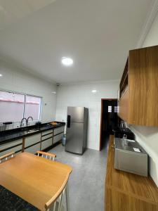 Casa nova na praia com piscina - Mongaguá